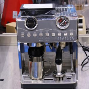 Two in one coffee machine together with its grinder
